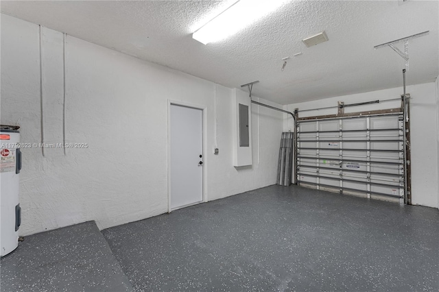 garage featuring visible vents, water heater, and electric panel