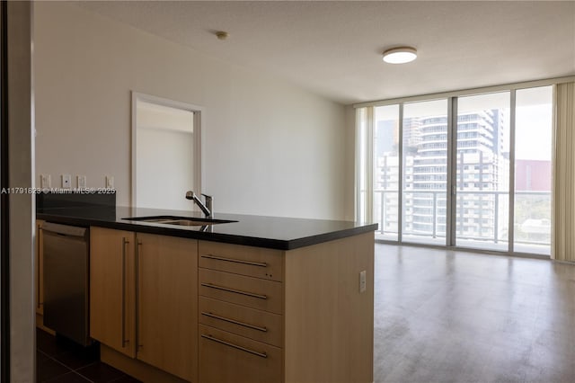 79 SW 12th St Unit 1403-S, Miami, FL 33130 - kitchen with a sink, dark countertops, floor to ceiling windows, and dishwasher