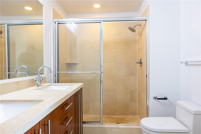 79 SW 12th St Unit 1403-S, Miami, FL 33130 - bathroom with double vanity, a sink, toilet, recessed lighting, and tiled shower
