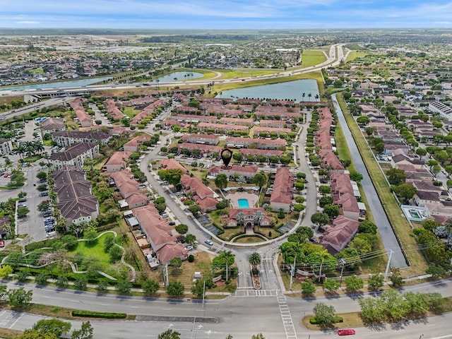 aerial view featuring a water view and a residential view