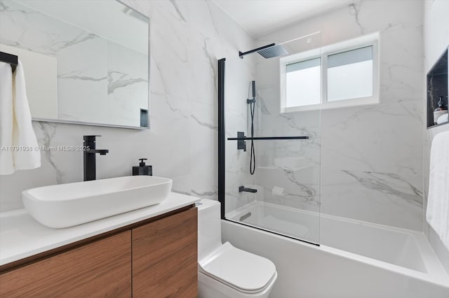 bathroom with shower / bath combination, toilet, and vanity