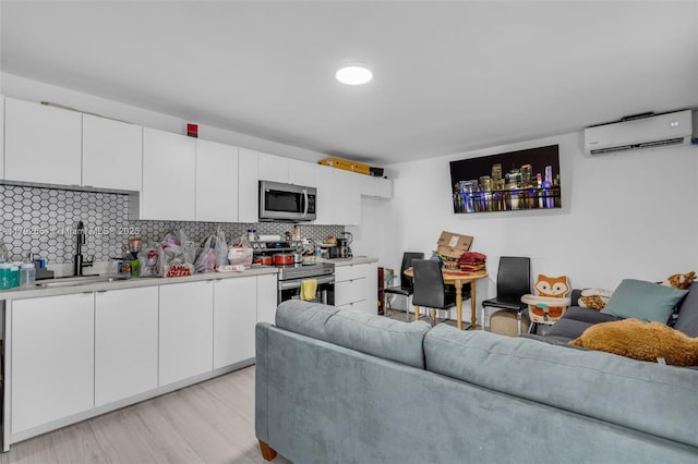 9000 NW 25th Ave, Miami, FL 33147 - living room featuring an AC wall unit