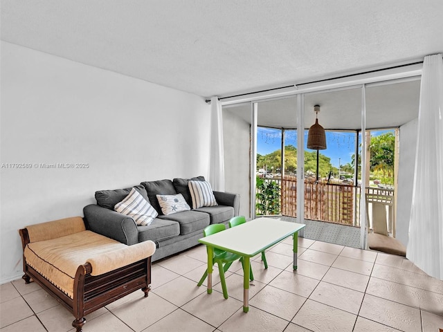 1780 NE 191st St Unit 205-2, Miami, FL 33179 - living area featuring light tile patterned floors