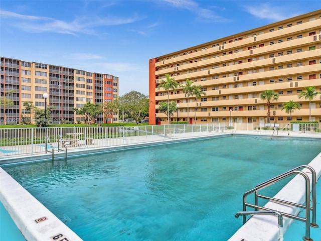1780 NE 191st St Unit 205-2, Miami, FL 33179 - community pool featuring fence