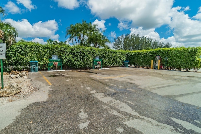 view of property's community featuring uncovered parking