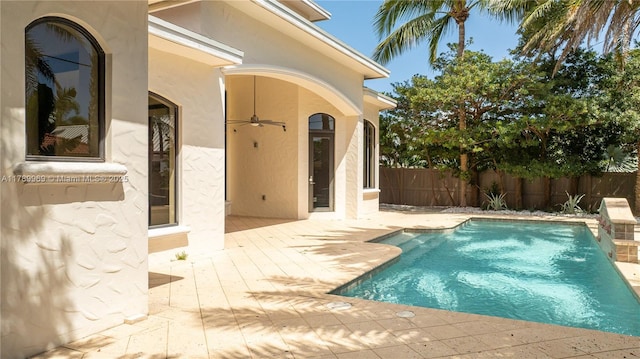 260 NE Wavecrest Ct, Boca Raton, FL 33432 - view of swimming pool with a fenced backyard and a patio area