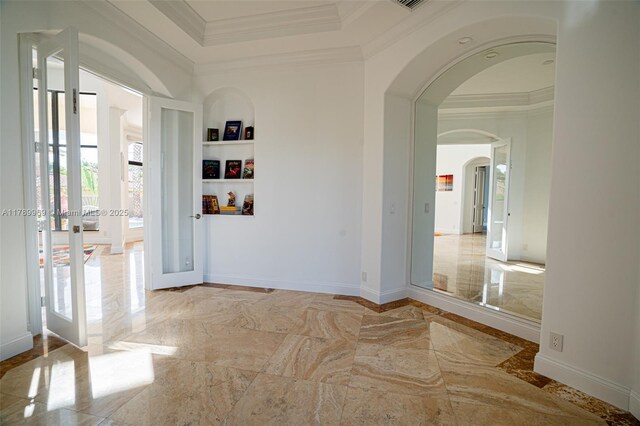 260 NE Wavecrest Ct, Boca Raton, FL 33432 - entryway with crown molding, marble tiled floors, arched walkways, and a raised ceiling