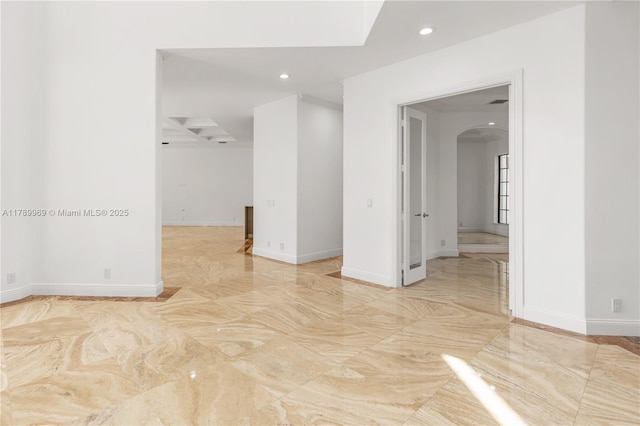 260 NE Wavecrest Ct, Boca Raton, FL 33432 - unfurnished room featuring arched walkways and recessed lighting
