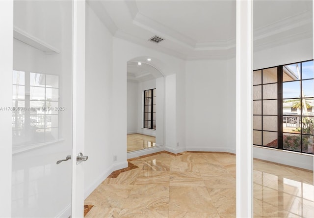 260 NE Wavecrest Ct, Boca Raton, FL 33432 - hall with ornamental molding, marble tiled floors, arched walkways, and a tray ceiling