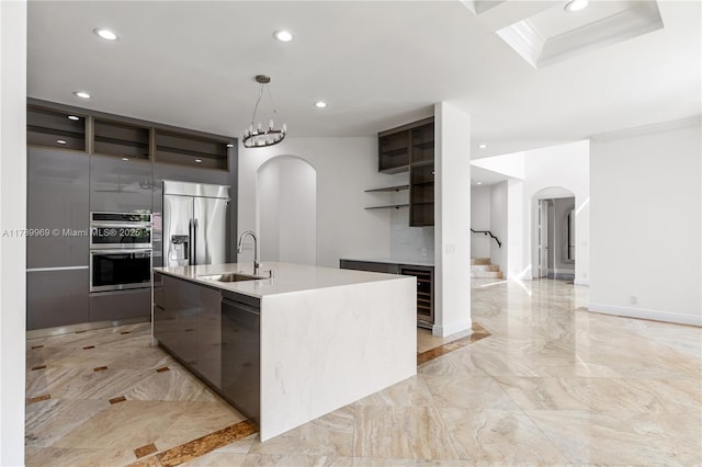 260 NE Wavecrest Ct, Boca Raton, FL 33432 - kitchen featuring arched walkways, open shelves, modern cabinets, appliances with stainless steel finishes, and recessed lighting