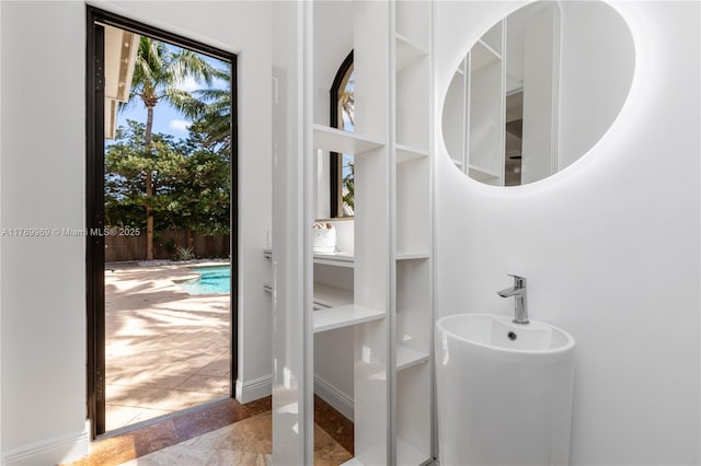 260 NE Wavecrest Ct, Boca Raton, FL 33432 - bathroom featuring baseboards