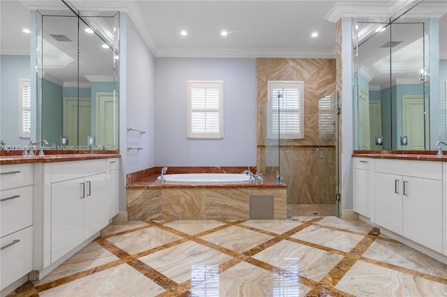 260 NE Wavecrest Ct, Boca Raton, FL 33432 - bathroom with inlaid floor details, two vanities, a garden tub, crown molding, and recessed lighting