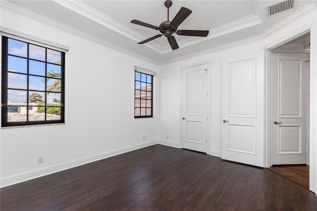 260 NE Wavecrest Ct, Boca Raton, FL 33432 - unfurnished bedroom with dark wood finished floors, ornamental molding, a raised ceiling, and ceiling fan