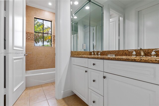 260 NE Wavecrest Ct, Boca Raton, FL 33432 - full bath featuring vanity, tile patterned floors, crown molding, and shower / washtub combination
