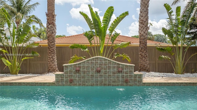260 NE Wavecrest Ct, Boca Raton, FL 33432 - view of swimming pool with a fenced backyard