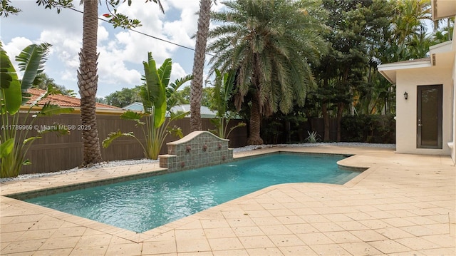 260 NE Wavecrest Ct, Boca Raton, FL 33432 - view of pool with a fenced backyard and a patio area
