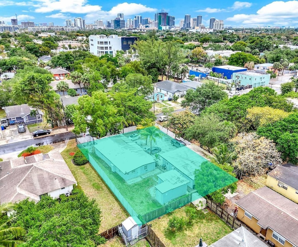 drone / aerial view with a view of city