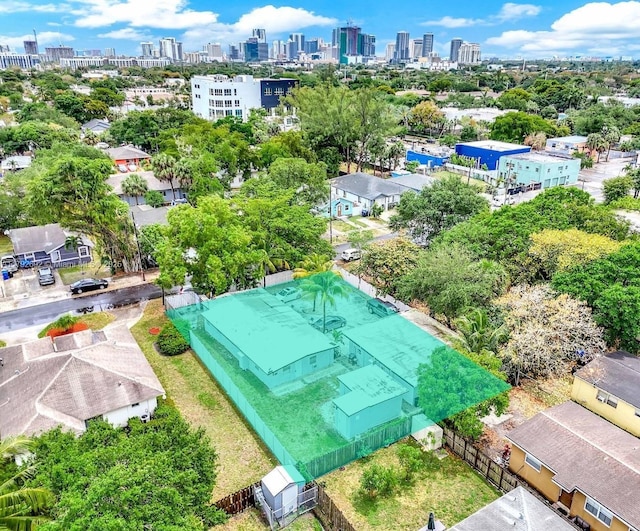 drone / aerial view with a view of city