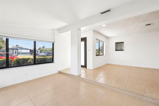 6451 Coolidge St, Hollywood, FL 33024 - tiled empty room with visible vents, recessed lighting, and baseboards