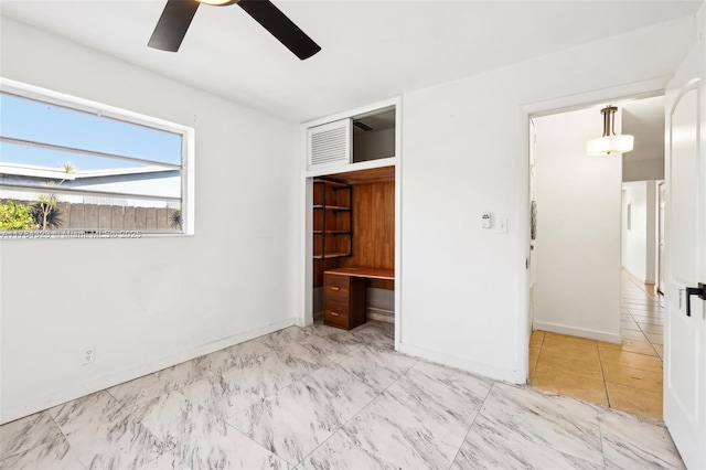 6451 Coolidge St, Hollywood, FL 33024 - unfurnished bedroom with baseboards and ceiling fan