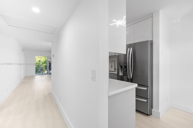 13000 SW 15th Ct Unit 310U, Pembroke Pines, FL 33027 - hall featuring baseboards, light wood-style floors, recessed lighting, and a sink