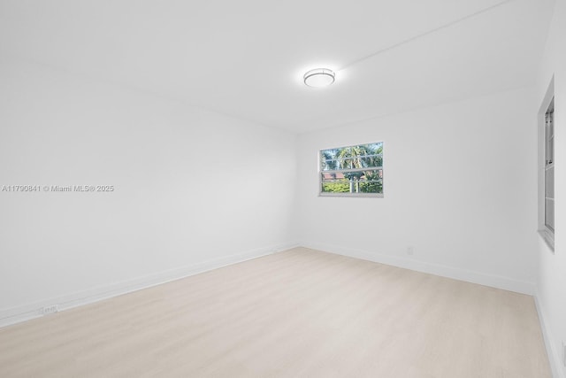 13000 SW 15th Ct Unit 310U, Pembroke Pines, FL 33027 - unfurnished room featuring baseboards and wood finished floors