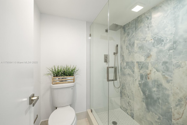 13000 SW 15th Ct Unit 310U, Pembroke Pines, FL 33027 - full bath with toilet, baseboards, and a stall shower