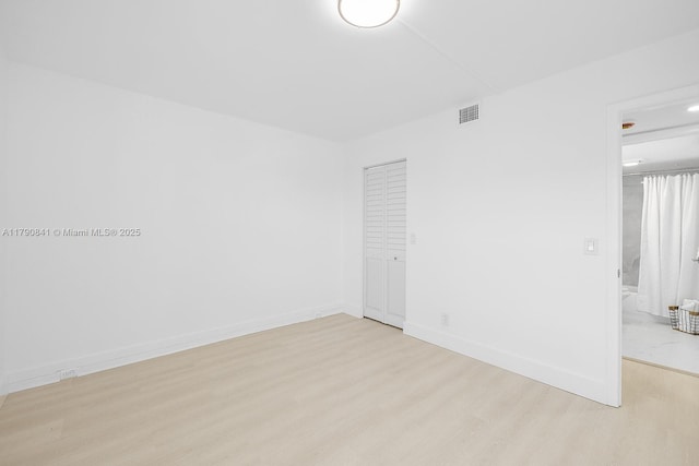 13000 SW 15th Ct Unit 310U, Pembroke Pines, FL 33027 - unfurnished room featuring baseboards, visible vents, and light wood-style floors
