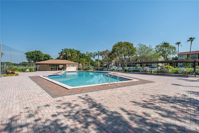 community pool featuring a patio