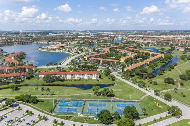 aerial view with a water view and golf course view