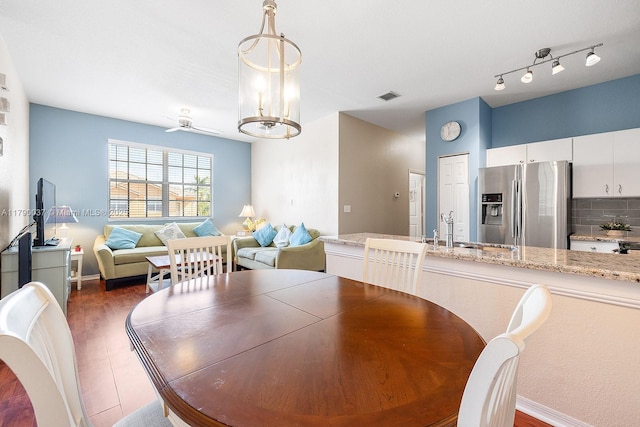 13127 SW 42nd St Unit 6203, Miramar, FL 33027 - dining space featuring a ceiling fan, baseboards, visible vents, and dark wood-style floors