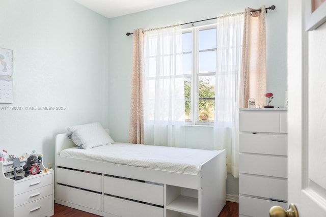 13127 SW 42nd St Unit 6203, Miramar, FL 33027 - bedroom with dark wood-style floors
