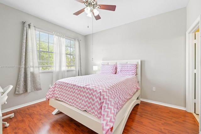 13127 SW 42nd St Unit 6203, Miramar, FL 33027 - bedroom featuring baseboards, ceiling fan, and wood finished floors