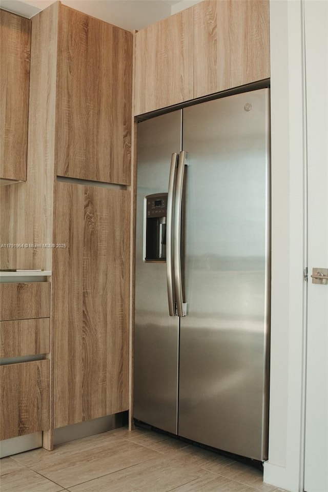 3900 Biscayne Blvd Unit N-723, Miami, FL 33137 - kitchen with stainless steel refrigerator with ice dispenser, modern cabinets, and light wood-style flooring
