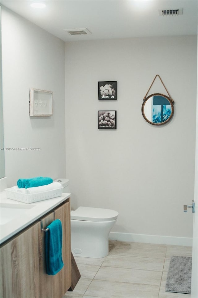 3900 Biscayne Blvd Unit N-723, Miami, FL 33137 - bathroom featuring vanity, toilet, tile patterned flooring, and baseboards