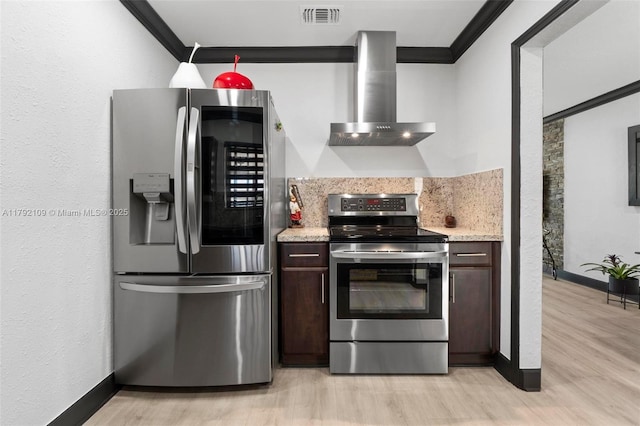 11981 SW 178th Ter, Miami, FL 33177 - kitchen featuring wall chimney range hood, crown molding, appliances with stainless steel finishes, and dark brown cabinetry