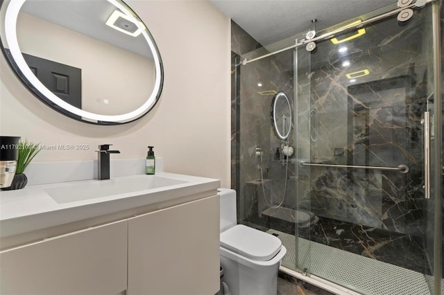 11981 SW 178th Ter, Miami, FL 33177 - bathroom with vanity, a marble finish shower, and toilet