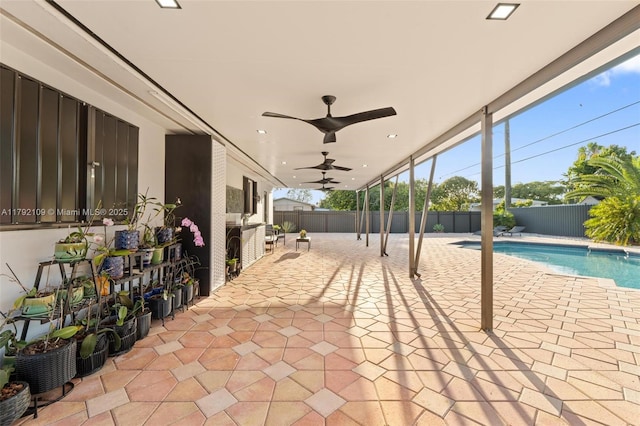 11981 SW 178th Ter, Miami, FL 33177 - view of patio with a fenced backyard, a fenced in pool, and ceiling fan