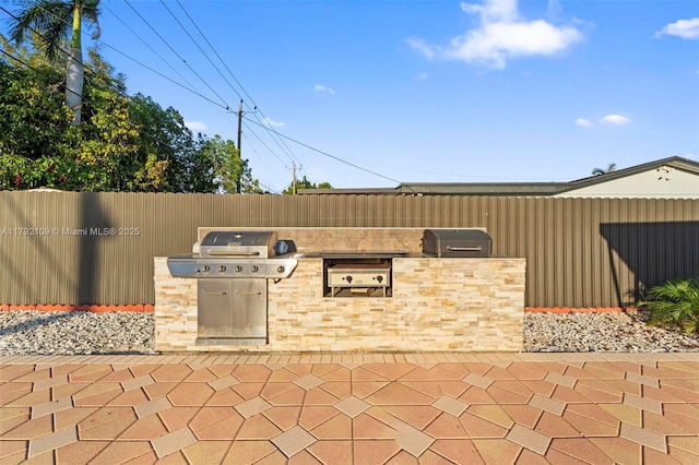 11981 SW 178th Ter, Miami, FL 33177 - view of patio / terrace featuring area for grilling, fence, and grilling area