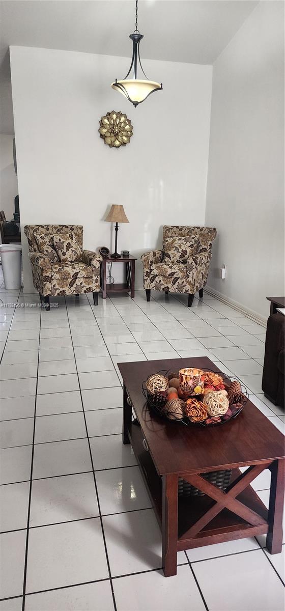 living room featuring tile patterned flooring