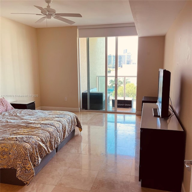 bedroom featuring access to outside, a ceiling fan, and floor to ceiling windows
