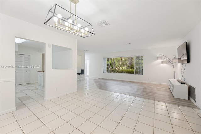 7920 SW 132nd St, Pinecrest, FL 33156 - interior space with visible vents, baseboards, and light tile patterned flooring