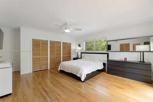 7920 SW 132nd St, Pinecrest, FL 33156 - bedroom featuring ceiling fan, multiple closets, and light wood-style flooring