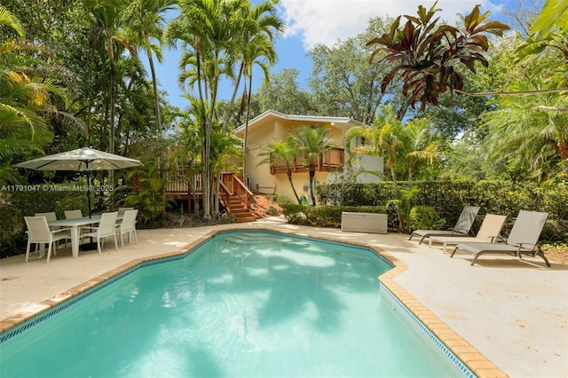 7920 SW 132nd St, Pinecrest, FL 33156 - pool with stairs, a patio area, and a wooden deck