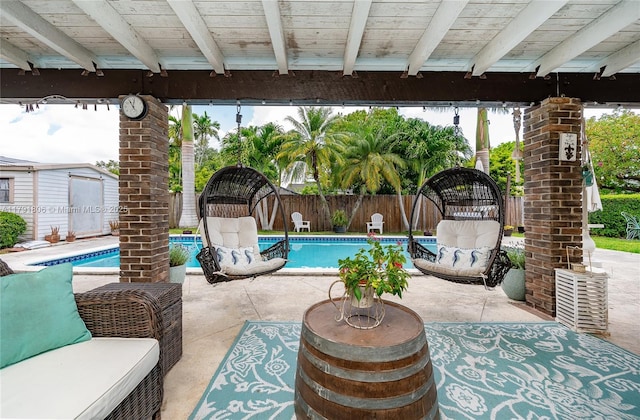 view of swimming pool featuring a fenced backyard, a fenced in pool, and a patio