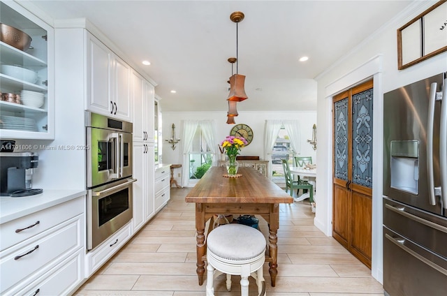 18525 SW 90th Ct, Cutler Bay, FL 33157 - kitchen featuring light countertops, recessed lighting, white cabinets, and appliances with stainless steel finishes