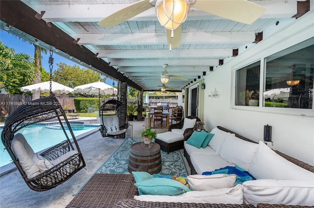 view of patio / terrace featuring a ceiling fan, fence, a fenced in pool, an outdoor hangout area, and outdoor dining space