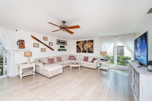 18525 SW 90th Ct, Cutler Bay, FL 33157 - living room with a ceiling fan and light wood finished floors