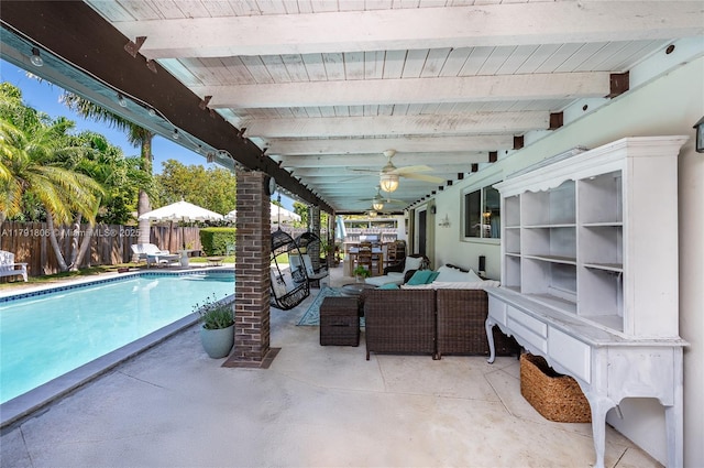 view of patio featuring an outdoor living space, fence, and a fenced in pool