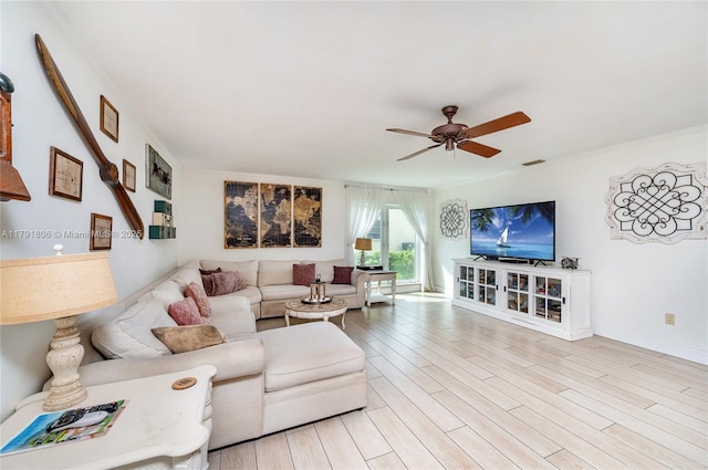18525 SW 90th Ct, Cutler Bay, FL 33157 - living room featuring light wood-style floors, baseboards, and a ceiling fan
